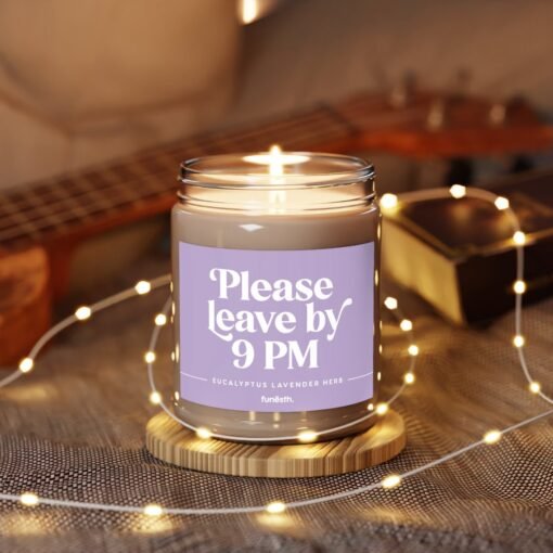 9oz eucalyptus lavender scented soy candle with a custom humorous label saying "Please leave by 9 PM" in a reusable glass jar.