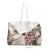 Floral and bird print weekender tote in spun polyester with rope handles, blending elegance with practicality for stylish travelers