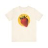 Stylish strawberry graphic tee in a retro design, inspired by pop culture and berry humor, suitable for all